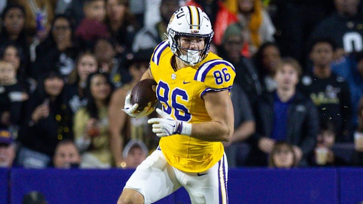 Nov 23, 2024; Baton Rouge, Louisiana, USA;  LSU Tigers tight end Mason Taylor (86) runs after a catch against the Vanderbilt Commodores during the first half at Tiger Stadium. 