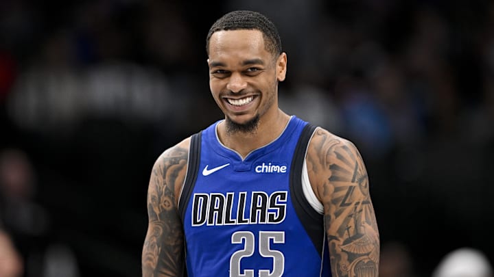 Mar 21, 2025; Dallas, Texas, USA; Dallas Mavericks forward P.J. Washington (25) smiles for the fans during the second half of the game against the Detroit Pistons at the American Airlines Center. Mandatory Credit: Jerome Miron-Imagn Images
