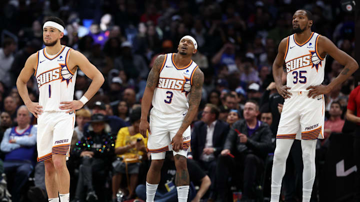 Jan 8, 2024; Los Angeles, California, USA;  Phoenix Suns guard Devin Booker (1) and guard Bradley Beal (3) and forward Kevin Durant (35) stands on the floor during the fourth quarter against the Los Angeles Clippers at Crypto.com Arena. Mandatory Credit: Kiyoshi Mio-Imagn Images