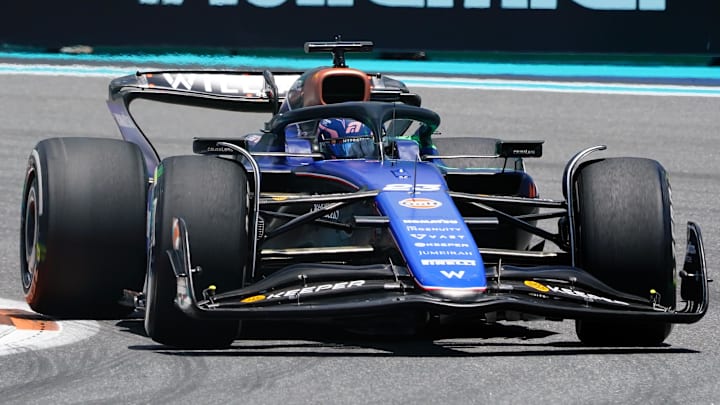 May 3, 2024; Miami Gardens, Florida, USA; Williams driver Alexander Albon (23) races into turn one during F1 practice at Miami International Autodrome. Mandatory Credit: John David Mercer-Imagn Images