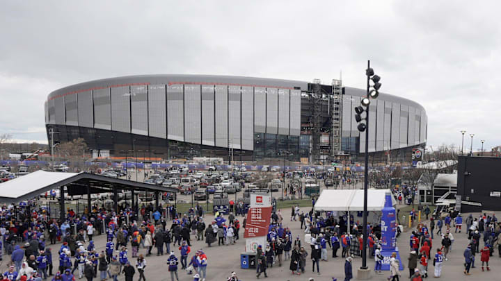 Fans enter Highmark Stadium before the start of the Bills home game against the Tampa Bay Buccaneers on Nov 16, 2025 in Orchard Park. In the background is the new stadium.