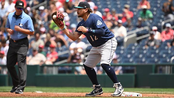 Jun 14, 2026; Washington, District of Columbia, USA; Seattle Mariners first baseman Josh Naylor (12) catches the ball at first base for an out against the Washington Nationals during the second inning at Nationals Park. Mandatory Credit: Rafael Suanes-Imagn Images Jun 14, 2026; Washington, District of Columbia, USA; Seattle Mariners first baseman Josh Naylor (12) catches the ball at first base for an out against the Washington Nationals during the second inning at Nationals Park. Mandatory Credit: Rafael Suanes-Imagn Images