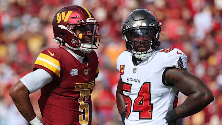 Sep 8, 2024; Tampa, Florida, USA;  Washington Commanders quarterback Jayden Daniels (5) and Tampa Bay Buccaneers linebacker Lavonte David (54) look on during the first half at Raymond James Stadium. Mandatory Credit: Kim Klement Neitzel-Imagn Images