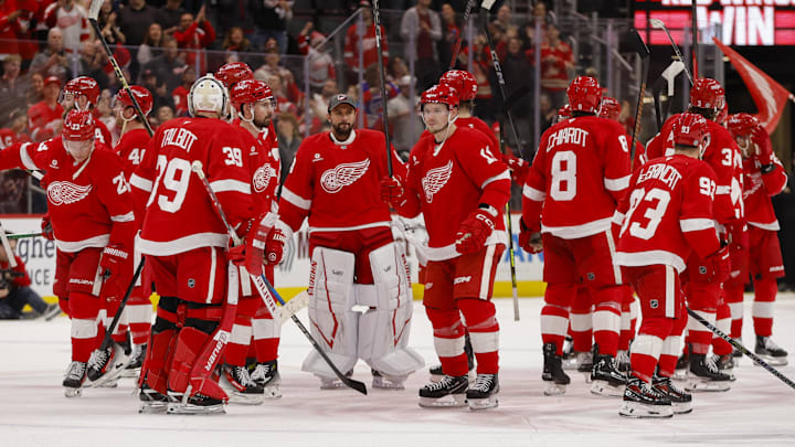Apr 14, 2025; Detroit, Michigan, USA; The Detroit Red Wings celebrate their win over the Dallas Stars at Little Caesars Arena. Mandatory Credit: Brian Bradshaw Sevald-Imagn Images