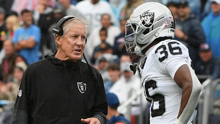 Sep 7, 2025; Foxborough, Massachusetts, USA; Las Vegas Raiders head coach Pete Carroll talks with cornerback Kyu Blu Kelly (36) at Gillette Stadium. Mandatory Credit: Bob DeChiara-Imagn Images
