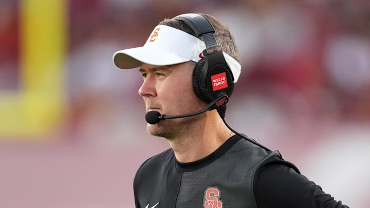 Aug 30, 2025; Los Angeles, California, USA; Southern California Trojans head coach Lincoln Riley watches from the sidelines against the Missouri State Bears in the first half at United Airlines Field at Los Angeles Memorial Coliseum. 