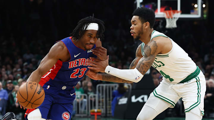 Dec 15, 2025; Boston, Massachusetts, USA; Detroit Pistons guard Jaden Ivey (23) drives on Boston Celtics guard Anfernee Simons (4) during the first quarter at TD Garden. Mandatory Credit: Winslow Townson-Imagn Images