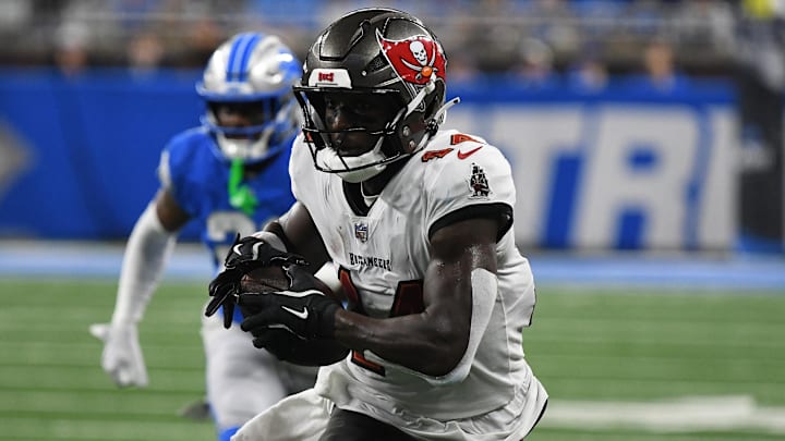 Sep 15, 2024; Detroit, Michigan, USA; Tampa Bay Buccaneers wide receiver Chris Godwin (14) scores a touchdown against the Detroit Lions in the second quarter at Ford Field. Mandatory Credit: Eamon Horwedel-Imagn Images Sep 15, 2024; Detroit, Michigan, USA; Tampa Bay Buccaneers wide receiver Chris Godwin (14) scores a touchdown against the Detroit Lions in the second quarter at Ford Field. Mandatory Credit: Eamon Horwedel-Imagn Images