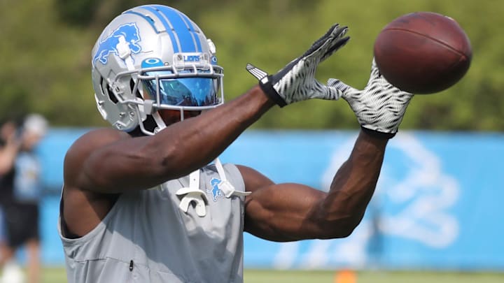 Former Detroit Lions receiver Quintez Cephus catches balls after the team's first padded practice of preseason camp Aug. 1, 2022 in Allen Park.