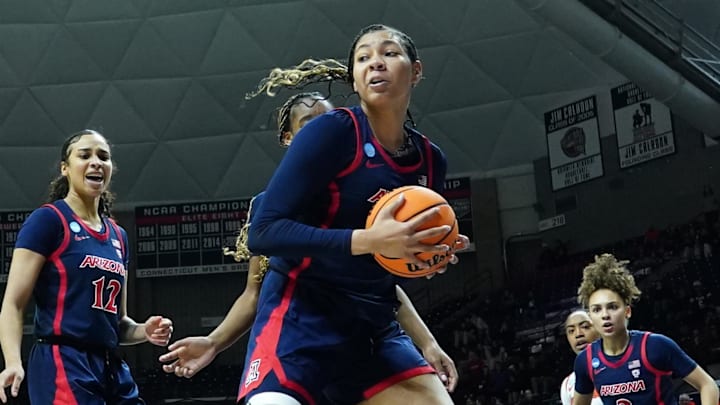 Mar 23, 2024; Storrs, Connecticut, USA; Syracuse Orange guard Alaina Rice (25) hits her head on the court against  Arizona Wildcats in the second half at Harry A. Gampel Pavilion. Mandatory Credit: David Butler II-Imagn Images