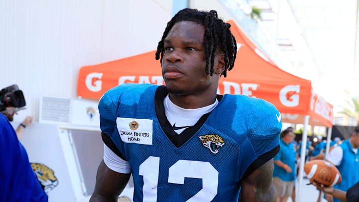Jacksonville Jaguars wide receiver Travis Hunter (12) walks to the locker room after an NFL training camp session at the Miller Electric Center, Tuesday, July 29, 2025, in Jacksonville, Fla. 