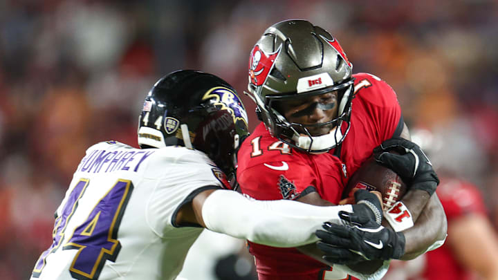 Oct 21, 2024; Tampa, Florida, USA; Tampa Bay Buccaneers wide receiver Chris Godwin (14) is pressured by Baltimore Ravens cornerback Marlon Humphrey (44) in the second quarter at Raymond James Stadium. Mandatory Credit: Nathan Ray Seebeck-Imagn Images Oct 21, 2024; Tampa, Florida, USA; Tampa Bay Buccaneers wide receiver Chris Godwin (14) is pressured by Baltimore Ravens cornerback Marlon Humphrey (44) in the second quarter at Raymond James Stadium. Mandatory Credit: Nathan Ray Seebeck-Imagn Images