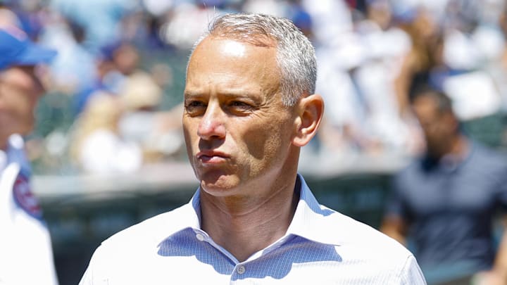 Jul 18, 2025; Chicago, Illinois, USA; Chicago Cubs President of Baseball Operations Jed Hoyer walks on the sidelines before a baseball game between the Chicago Cubs and Boston Red Sox at Wrigley Field. 