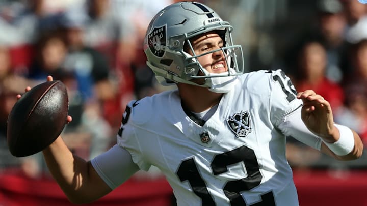Dec 8, 2024; Tampa, Florida, USA; Las Vegas Raiders quarterback Aidan O'Connell (12) throws the ball during the first half against the Tampa Bay Buccaneers at Raymond James Stadium. Mandatory Credit: Kim Klement Neitzel-Imagn Images Dec 8, 2024; Tampa, Florida, USA; Las Vegas Raiders quarterback Aidan O'Connell (12) throws the ball during the first half against the Tampa Bay Buccaneers at Raymond James Stadium. Mandatory Credit: Kim Klement Neitzel-Imagn Images