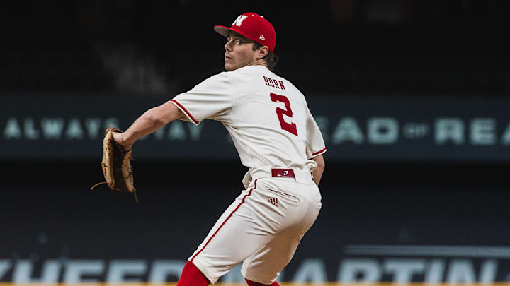 Nebraska pitcher Ty Horn delivers against Louisville in the Amegy Bank College Baseball Series in Arlington, Texas.