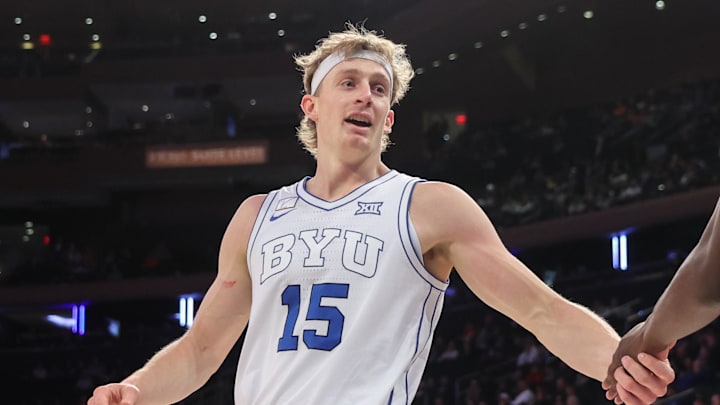Dec 9, 2025; New York, New York, USA;  BYU Cougars guard Richie Saunders (15) and forward AJ Dybantsa (3) at Madison Square Garden. Mandatory Credit: Wendell Cruz-Imagn Images