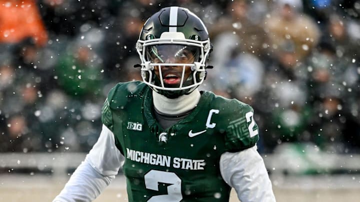 Michigan State's Aidan Chiles prepares to snap the ball against Rutgers during the second quarter on Saturday, Nov. 30, 2024, at Spartan Stadium in East Lansing.