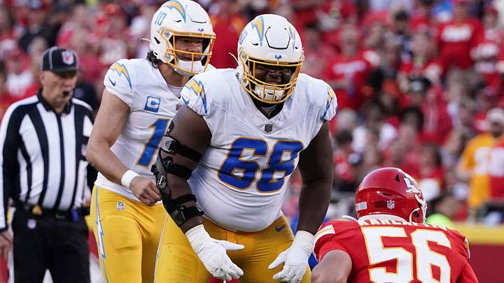 Oct 12, 2023; Kansas City, Missouri, USA; Los Angeles Chargers guard Jamaree Salyer (68) lines up across from Kansas City Chiefs defensive end George Karlaftis (56) during the game at GEHA Field at Arrowhead Stadium. Mandatory Credit: Denny Medley-USA TODAY Sports