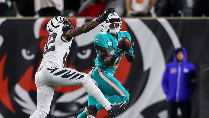 Sep 29, 2022; Cincinnati, Ohio, USA; Miami Dolphins wide receiver Tyreek Hill (10) catches a pass against Cincinnati Bengals cornerback Chidobe Awuzie (22) in the second half at Paycor Stadium. Mandatory Credit: Katie Stratman-USA TODAY Sports Sep 29, 2022; Cincinnati, Ohio, USA; Miami Dolphins wide receiver Tyreek Hill (10) catches a pass against Cincinnati Bengals cornerback Chidobe Awuzie (22) in the second half at Paycor Stadium. Mandatory Credit: Katie Stratman-USA TODAY Sports