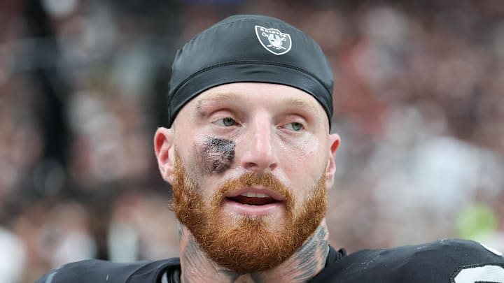 Sep 28, 2025; Paradise, Nevada, USA; Las Vegas Raiders defensive end Maxx Crosby (98) looks on from the sideline during the first quarter against the Chicago Bears at Allegiant Stadium. Mandatory Credit: Kiyoshi Mio-Imagn Images