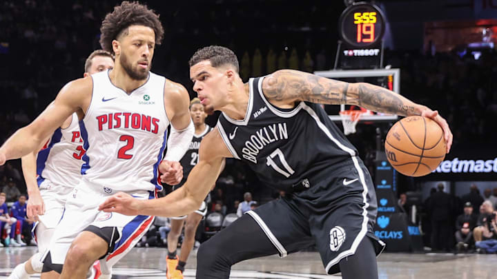 Mar 10, 2026; Brooklyn, New York, USA;  Brooklyn Nets forward Michael Porter Jr. (17) looks to drive past Detroit Pistons guard Cade Cunningham (2) in the first quarter at Barclays Center. Mandatory Credit: Wendell Cruz-Imagn Images