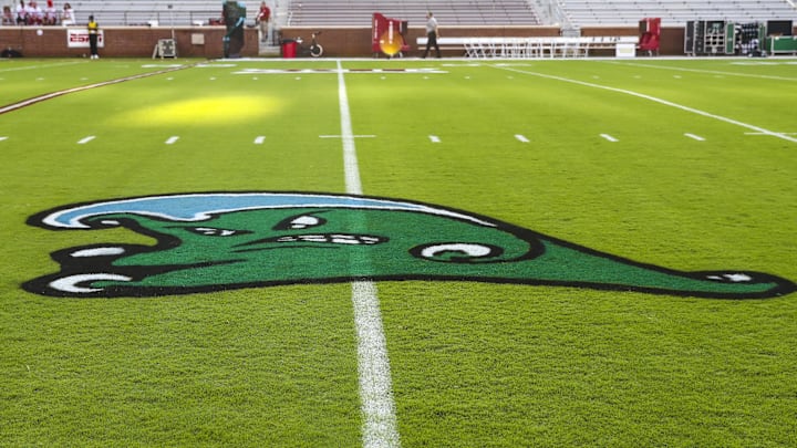 The logo of the Tulane Green Wave