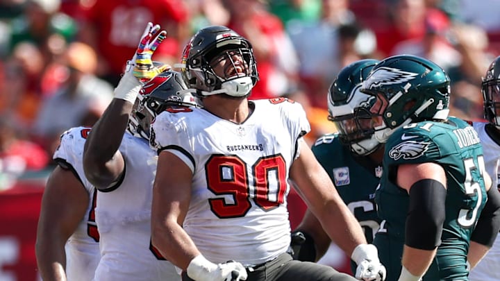 Sep 29, 2024; Tampa, Florida, USA; Tampa Bay Buccaneers defensive end Logan Hall (90) reacts after a sack against the Philadelphia Eagles in the fourth quarter at Raymond James Stadium. Mandatory Credit: Nathan Ray Seebeck-Imagn Images