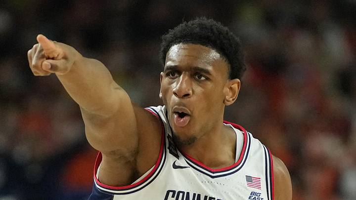 Apr 4, 2026; Indianapolis, IN, USA; UConn Huskies forward Tarris Reed Jr. (5) reacts after a play against the Illinois Fighting Illini during the first half of a semifinal of the Final Four of the men's 2026 NCAA Tournament at Lucas Oil Stadium. Mandatory Credit: Bob Donnan-Imagn Images Apr 4, 2026; Indianapolis, IN, USA; UConn Huskies forward Tarris Reed Jr. (5) reacts after a play against the Illinois Fighting Illini during the first half of a semifinal of the Final Four of the men's 2026 NCAA Tournament at Lucas Oil Stadium. Mandatory Credit: Bob Donnan-Imagn Images