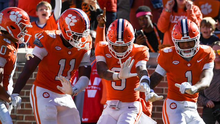 Clemson tight end Olsen Patt-Henry (11) will miss the spring, while players like Tristan Smith (3) and TJ Moore (1) are active.