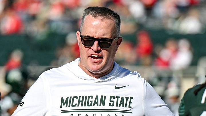 Michigan State’s head coach Pat Fitzgerald, center, talks with Jaziun Patterson, left, and Marvis Parrish before the football game against Nebraska on Saturday, Sept. 26, 2026, in East Lansing. Michigan State’s head coach Pat Fitzgerald, center, talks with Jaziun Patterson, left, and Marvis Parrish before the football game against Nebraska on Saturday, Sept. 26, 2026, in East Lansing.