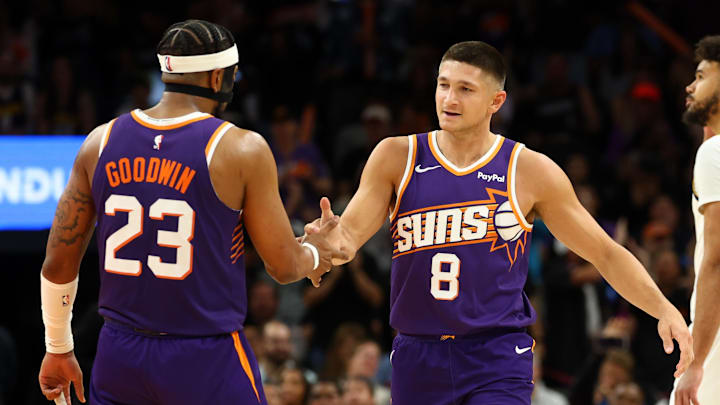 Mar 24, 2026; Phoenix, Arizona, USA; Phoenix Suns guard Grayson Allen (8) celebrates with teammate Jordan Goodwin (23) against the Denver Nuggets in the second half at Mortgage Matchup Center. Mandatory Credit: Mark J. Rebilas-Imagn Images Mar 24, 2026; Phoenix, Arizona, USA; Phoenix Suns guard Grayson Allen (8) celebrates with teammate Jordan Goodwin (23) against the Denver Nuggets in the second half at Mortgage Matchup Center. Mandatory Credit: Mark J. Rebilas-Imagn Images