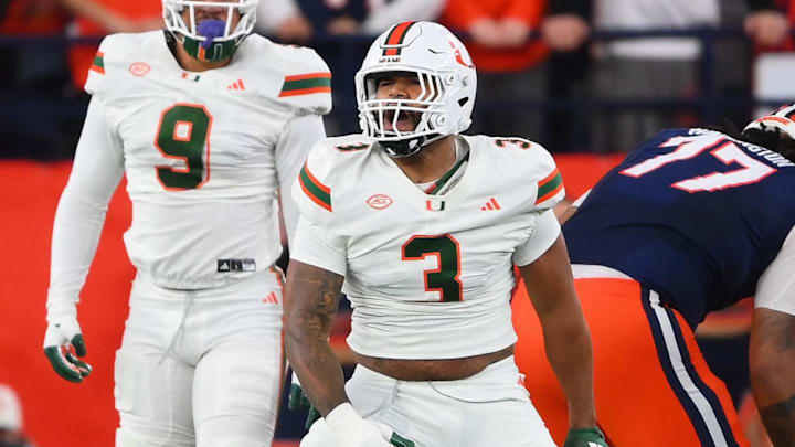 Nov 30, 2024; Syracuse, New York, USA; Miami Hurricanes defensive lineman Akheem Mesidor (3) reacts after a play against the Syracuse Orange during the first half at the JMA Wireless Dome. Mandatory Credit: Rich Barnes-Imagn Images