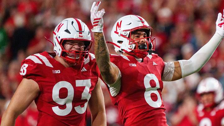 Kade Pietrzak and Donovan Jones celebrate after a sack against North Dakota.