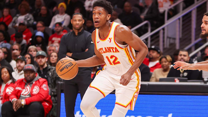 Dec 2, 2024; Atlanta, Georgia, USA; Atlanta Hawks forward De'Andre Hunter (12) drives to the basket against the New Orleans Pelicans in the second quarter at State Farm Arena. Mandatory Credit: Brett Davis-Imagn Images