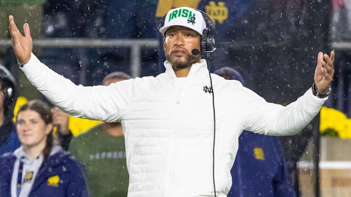 Oct 18, 2025; South Bend, Indiana, USA;  Notre Dame Fighting Irish head coach Marcus Freeman reacts to the play against the Southern California Trojans during the second half at Notre Dame Stadium. 