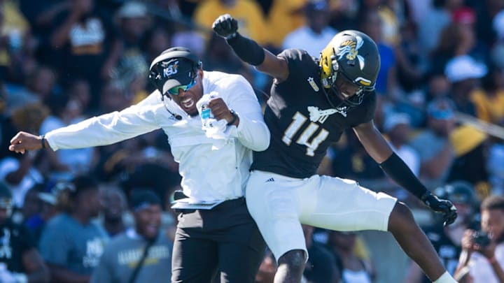 Alabama State Hornets defensive back Adrian Maddox (14) celebrates a fourth down stop as Alabama State Hornets takes on Jackson State Tigers at ASU Stadium in Montgomery, Ala., on Saturday, Oct. 8, 2022. Jackson State Tigers leads Alabama State Hornets 10-6 at halftime.