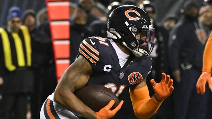 Jan 4, 2026; Chicago, Illinois, USA; Chicago Bears safety Kevin Byard III (31) runs with the ball after making an interception against the Detroit Lions during the second half at Soldier Field. Mandatory Credit: Matt Marton-Imagn Images