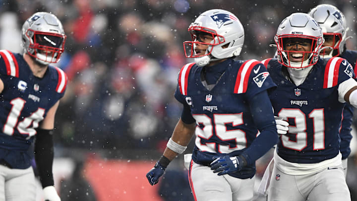 Jan 18, 2026; Foxborough, MA, USA; New England Patriots cornerback Marcus Jones (25) reacts after scoring a touchdown in the second quarter against the Houston Texans in an AFC Divisional Round game at Gillette Stadium. Mandatory Credit: Brian Fluharty-Imagn Images