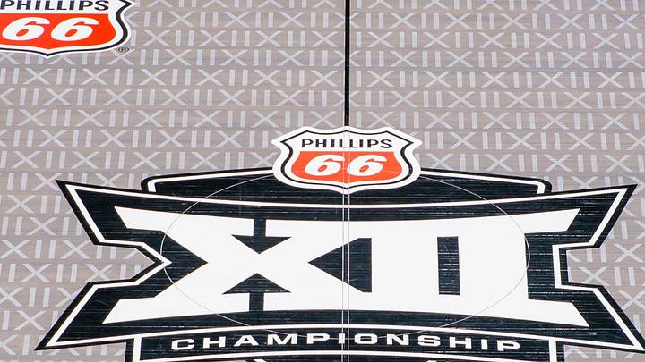 Mar 13, 2026; Kansas City, MO, USA; Big 12 logo center court after the LED floor was removed and a traditional wood floor was installed for the remaining tournament games prior to the game between the Iowa State Cyclones and the Arizona Wildcats at T-Mobile Center. Mandatory Credit: William Purnell-Imagn Images Mar 13, 2026; Kansas City, MO, USA; Big 12 logo center court after the LED floor was removed and a traditional wood floor was installed for the remaining tournament games prior to the game between the Iowa State Cyclones and the Arizona Wildcats at T-Mobile Center. Mandatory Credit: William Purnell-Imagn Images