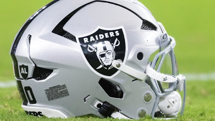 Aug 23, 2025; Glendale, Arizona, USA; Detailed view of a Las Vegas Raiders helmet during a preseason NFL game at State Farm Stadium. Mandatory Credit: Mark J. Rebilas-Imagn Images
