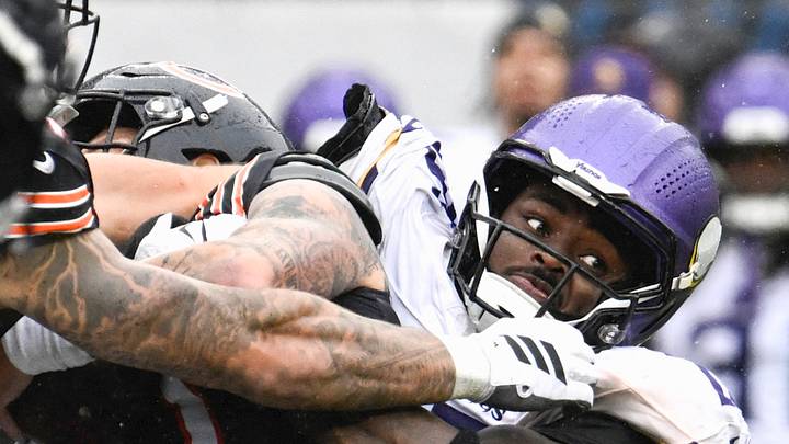 Minnesota Vikings linebacker Dallas Turner (15) sacks Chicago Bears quarterback Tyson Bagent (17) to end the game