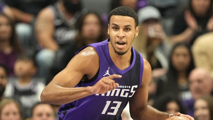 Apr 11, 2025; Sacramento, California, USA; Sacramento Kings forward Keegan Murray (13) dribbles against the Los Angeles Clippers during the first quarter at Golden 1 Center.