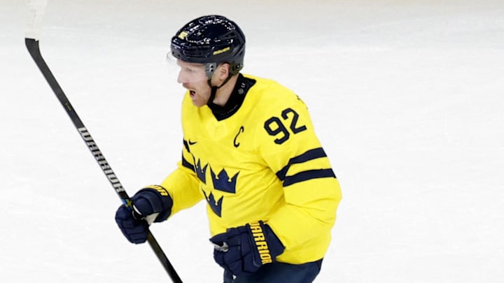 [US, Mexico & Canada customers only] Feb 11, 2026; Milan, Italy; Gabriel Landeskog of Sweden celebrates scoring their first goal  against Italy in men's ice hockey group B play during the Milano Cortina 2026 Olympic Winter Games at Milano Santagiulia Ice Hockey Arena. Mandatory Credit: David W Cerny/Reuters via Imagn Images