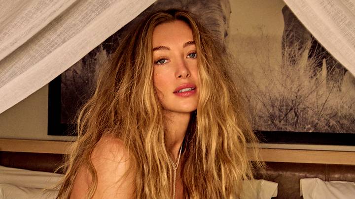 Penny Lane was photographed by Ruven Afanador in Botswana. Swimsuit by PatBO. Necklaces by The Invisibles.