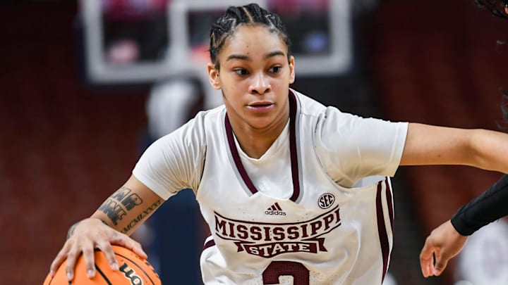 Mississippi State guard Jerkaila Jordan (2) moves the ball past Texas A & M guard Tineya Hylton (3) during the third quarter of the SEC Women's Basketball Tournament game three at the Bon Secours Wellness Arena in Greenville, S.C. Thursday, March 7, 2024.
