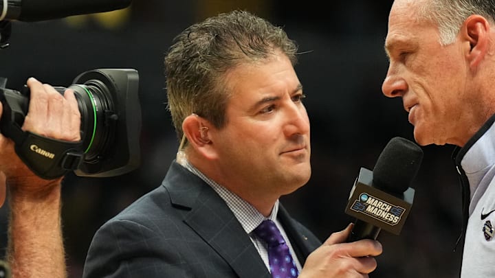 Mar 17, 2023; Denver, CO, USA; TCU Horned Frogs head coach Jamie Dixon is interviewed by ESPN reporter Andy Katz during the first half against the Arizona State Sun Devils at Ball Arena. Mandatory Credit: Ron Chenoy-Imagn Images