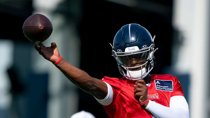 Tennessee Titans quarterback Cam Ward (1) throws during the Tennessee Titans first day of training camp at Ascension Saint Thomas Sports Park in Nashville, Tenn., Wednesday, July 23, 2025. Tennessee Titans quarterback Cam Ward (1) throws during the Tennessee Titans first day of training camp at Ascension Saint Thomas Sports Park in Nashville, Tenn., Wednesday, July 23, 2025.