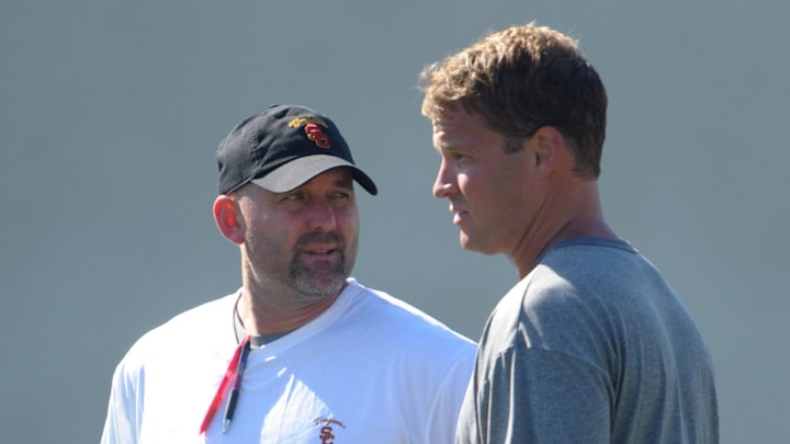 Former Southern California Trojans coach Lane Kiffin (right) and former wide receivers coach John Morton 