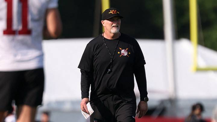 Ashburn, VA, USA; Washington Commanders head coach Dan Quinn walks on the field at training camp. At BigBear.ai Performance Center at Commanders Park. Mandatory Credit: Geoff Burke-Imagn Images Ashburn, VA, USA; Washington Commanders head coach Dan Quinn walks on the field at training camp. At BigBear.ai Performance Center at Commanders Park. Mandatory Credit: Geoff Burke-Imagn Images