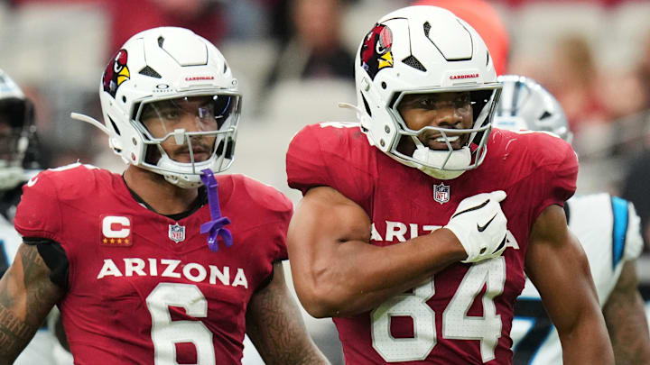 Arizona Cardinals tight end Elijah Higgins (84) celebrates his catch against the Carolina Panthers at State Farm Stadium on Sept 14, 2025.